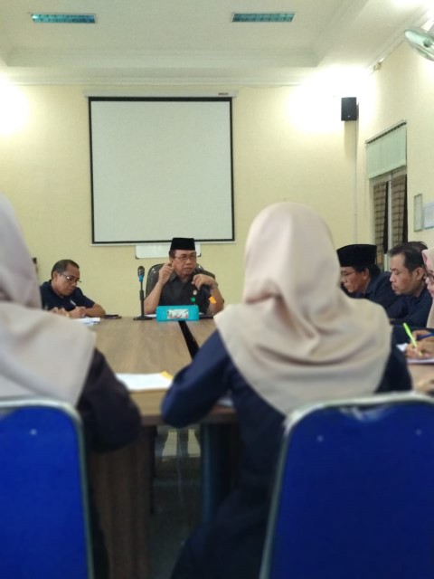 rapat 1